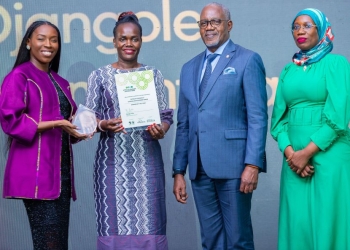 L-R Ivorian sprinter and silver medallist Murielle Ahouré-Demps, UDB Managing Director Dr. Patricia Ojangole, UDB Board Chair Geoffrey Kihuguru and UDB Secretary Sophie Nakandi