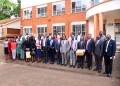 Officials from the Church of Jesus Christ of Latter-day Saints and Makerere University pose with the donated laptops and projectors in Kampala, Uganda, on May 5, 2025. The equipment will support teaching, learning, and research at the university's School of Business.