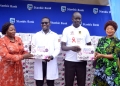 Stanbic Business Incubator Chief Executive Catherine Poran and Dr. Paulina Chiwangu, UN Women Country Representative in Uganda, handing over mama Kits to the hospital leadership in West Nile