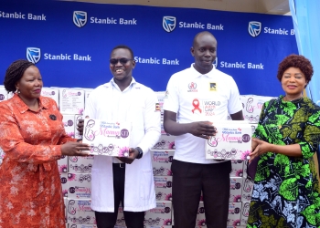 Stanbic Business Incubator Chief Executive Catherine Poran and Dr. Paulina Chiwangu, UN Women Country Representative in Uganda, handing over mama Kits to the hospital leadership in West Nile