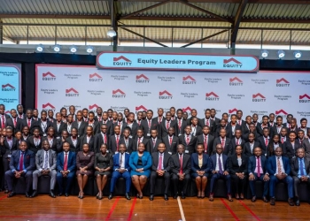 Equity Bank officials join the 100 students commissioned into the fourth cohort of the Equity Leaders Program in Kampala, Uganda, on May 10, 2025. The program aims to develop future leaders through mentorship and practical experience.