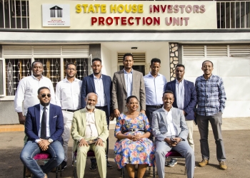 Col. Edith Nakalema, Head of State House Investors Protection Unit (Second Right seated), Ezra Chebrengus, Managing Director Ezra Group who led the team (Right seated) together with other Eritrean investors take a group picture after the meeting held at State House Investors Protection Unit Offices on Wednesday 18 June 2025. PPU PHOTO.