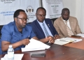 UHRC Commissioner, Crispin Kaheru (Right) and other stakeholders during the press briefing held on Thursday at UHRC headquarters in Kampala.