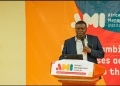 Johnson Abitekaniza, Assistant , the Commissioner in charge of training and skills development at the Ministry of Trade and cooperatives addressing participants.