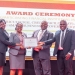Pride Bank Limited officials pose with their awards in Kampala, Uganda. The bank was recently recognized by the Bank of Uganda as First Runner-Up for its leading agricultural and small business credit solutions.