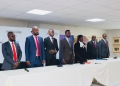 Hon. Robert Kyagulanyi Ssentamu and other officials at ULS headquarters on Tuesday.