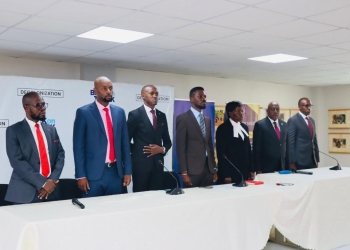 Hon. Robert Kyagulanyi Ssentamu and other officials at ULS headquarters on Tuesday.
