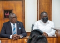 David Balondemu (left) and his co-accused appear in court during a hearing in Kampala.