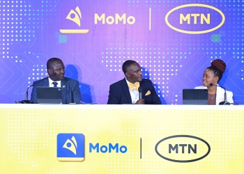 Brian Mulondo (C) moderates the MTN MoMo Power to be More campaign Launch with MTN's Richard Yego (L) and Jemima Kariuki (R)