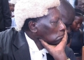 Explore the pivotal 2015 incident where retired Justice George Kanyeihamba's public display of emotion in a court corridor underscored his unwavering commitment to Uganda's constitutional principles.