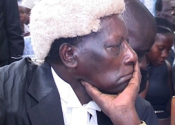 Explore the pivotal 2015 incident where retired Justice George Kanyeihamba's public display of emotion in a court corridor underscored his unwavering commitment to Uganda's constitutional principles.