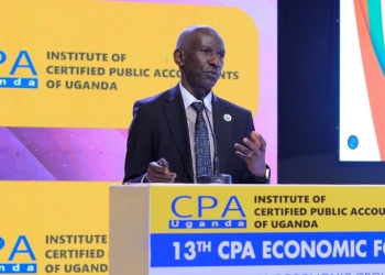 NARO Director General Dr. Yona Baguma delivering his presentation at the CPA Economic Forum in Entebbe