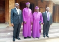 Archbishop Stephen Kaziimba Mugalu and members of the organizing committee.