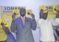 Engineer Jonard Asiimwe displaying his Manifesto after the launch ceremony on Wednesday.