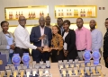 Uganda Breweries MD Andrew Kilonzo with his team with the award