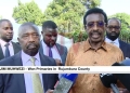 Maj. Gen. Jim Muhwezi, Uganda's Security Minister, addresses the media after appearing before the National Resistance Movement (NRM) elections tribunal in Kampala to defend his primary victory on Wednesday, July 30.