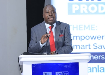 Japheth Aritho, managing director of Airtel Mobile Commerce Uganda, delivers his address during the launch of the SchoolPay Savings scheme.