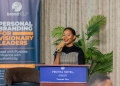 Public relations strategist Lyn Tukei addresses executives at the Visionary Leaders branding forum in Kampala, emphasizing personal branding as a strategic asset.