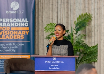 Public relations strategist Lyn Tukei addresses executives at the Visionary Leaders branding forum in Kampala, emphasizing personal branding as a strategic asset.