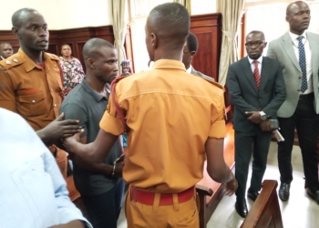 Bobi Young (in middle) at High Court on Monday