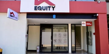 Equity Bank has moved its Bugolobi branch to a new, more modern and accessible location as part of a strategy to improve customer convenience and service. The branch has relocated from Luthuli Avenue to **Hensley Business Park, Plot 3-5 Mpanga Close, Mulwana Road**. The new location is centrally positioned within one of Kampala's busiest suburbs, making it easier for both business and retail customers to access. According to a statement from the bank, the new branch offers a more spacious banking hall with enhanced facilities for private consultations. It also includes dedicated meeting rooms for financial advisory sessions and comprehensive money management discussions. The move also provides customers with improved parking and is located near major landmarks to enhance accessibility.