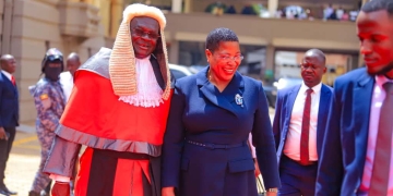 Chief Justice Alfonse Owiny Dollo welcoming, Hon. Annet Anita Among, the Speaker of Parliament.