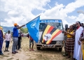 State Minister for Gender and Culture, Peace Regis Mutuuzo, and James Kingori, Head of the WFP Karamoja Area Office, flag off the Nutri-School Bus. The new initiative, a partnership between the government and WFP, aims to fight malnutrition and boost school enrollment in the Karamoja region.