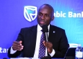 Israel Arinaitwe, Head Personal Banking Stanbic Bank Uganda making remarks during the press conference at Umoja House in Kampala