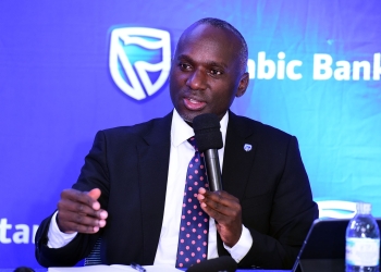 Israel Arinaitwe, Head Personal Banking Stanbic Bank Uganda making remarks during the press conference at Umoja House in Kampala