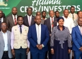 Stanbic Bank Executive Director, Samuel Fredrick Mwogeza (3L) second row, Makerere University Vice-chancellor, Barnabas Nawangwe (3R) second row, Balaam Barugahara, the Minister of State for Youth and Children Affair