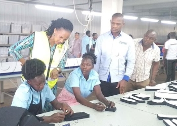 Uganda's Minister of Labour, Esther Anyakun, confronts investors at Kapeeka Industrial Park after workers allege beatings and abusive treatment. The Minister demands investors comply with labour laws and improve unsafe working conditions.