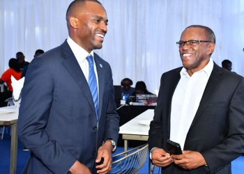 Grace Semakula (left), the Chief Executive of SBG Securities, having a light moment with Damoni Kitabire (right), the Board Chairperson of Stanbic Bank Uganda at the Stanbic Unit Trust Launch