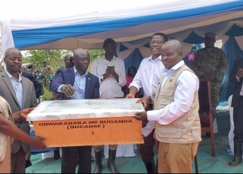 Buganda PM Charles Peter Mayiga urges Busujju farmers to turn coffee into a commercial business under the Mwanyi Terimba campaign to fight poverty.