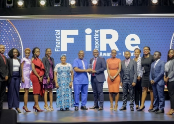 Peter Ssenyange (C), the Chief Financial Officer at Pearl Bank, receiving the Banking Services General Banking Award from John Bosco Ntangaare(7th L), Consultant at the World Bank and ICPAU's former Director of Education. Looking on are staff from Pearl Bank (formerly PostBank Uganda) and other guests. This was at the recently concluded 2025 Financial Reporting (FiRe) Awards, held at Hotel Africana on November 5, 2025, under the theme: Sustainability Practices and Reporting in Uncertain Global Times.