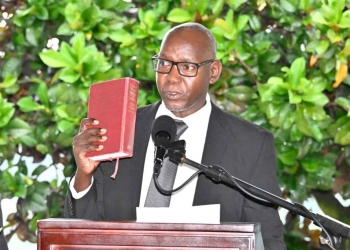 Newly appointed DPP, Lino Anguzu taking oath.