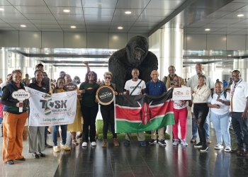 Kenyan Tour Traders From The Coast Pose for a family Photo as they arrived at entebbe airport