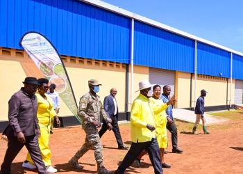 President Musevni chats with Speaker Anita Among after commissioning Acomai irrigation scheme in Bukedea district on Wednesday. PPU Photo