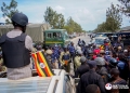 Police block the convoy of National Unity Platform presidential candidate Robert Kyagulanyi, widely known as Bobi Wine, as he attempts to campaign in Bunyangabu, Uganda, Tuesday.