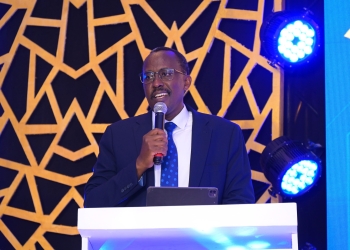 John Musinguzi Rujoki, the Commissioner General of the Uganda Revenue Authority (URA) speaking at the Sheraton Hotel during the launch of the enhanced URA services on the MoMo platform
