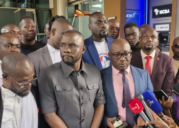 Mr Mathias Walukaga together with lawyers and supporters at the High Court (PHOTO/Henry Jjemba)