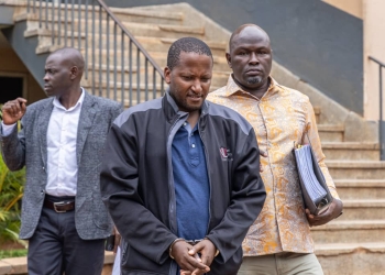 Businessman Andrew Muhandiki has been remanded in Kampala on charges of stealing 815 million shillings from a teachers' savings cooperative through a fake land deal.