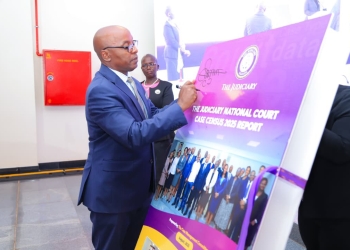 The Chief Justice,Dr. Flavian Zeija launching the Report.