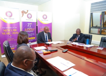 Dr.Andrew Khaukha addressing the press alongside, Justice Mike Chibita and Her Worship Pamella Ocaya, the Acting Chief Registrar.