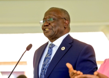 UNEB Executive Director Dan N. Odongo presents the 2025 Primary Leaving Examination results Friday in Kampala, noting a 2.6% increase in candidate registration and a rise in the number of students achieving Division 1.