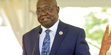 UNEB Executive Director Dan N. Odongo presents the 2025 Primary Leaving Examination results Friday in Kampala, noting a 2.6% increase in candidate registration and a rise in the number of students achieving Division 1.