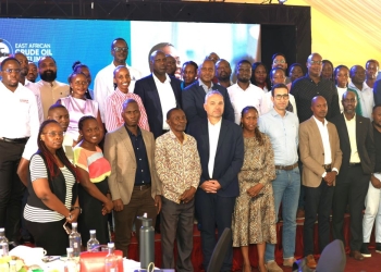 Officials from the East African Crude Oil Pipeline pose for a group photo at the Sheraton Kampala Hotel following a forum on how local suppliers can tap into the 246,000-barrel-per-day oil project. Pictured are EACOP Commissioning Manager Kamal Bouzalmata, fourth from right, and National Content Manager Merian Ahabwe, fifth from right.