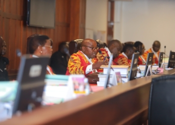 Chief Justice, Dr. Flavian Zeija, leading the panel.