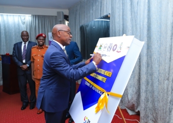 Chief Justice Dr.Flavian Zeija launching the ....