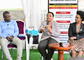 Col. Edith Nakalema (in middle) addressing content Creators.