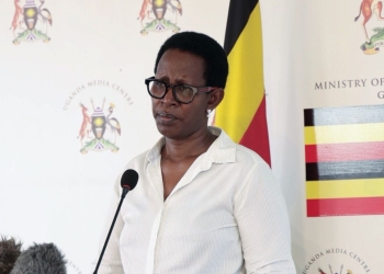 Health Ministry Permanent Secretary Dr. Diana Atwine addresses journalists at the Uganda Media Centre in Kampala on Wednesday, detailing new border protocols and a mandatory 21-day self-isolation period for travelers returning from the Democratic Republic of Congo following an Ebola outbreak.